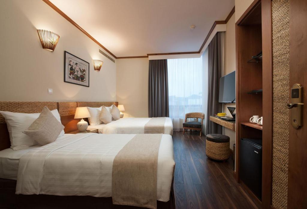 Deluxe Triple Room (3 Singles or 1 Double + 1 Single)