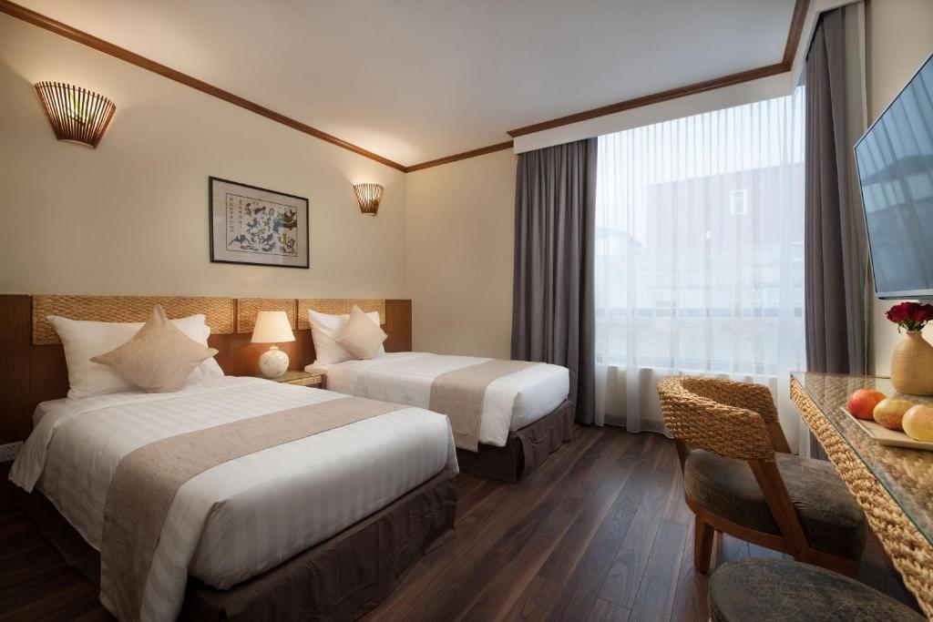 Deluxe Triple Room (3 Singles or 1 Double + 1 Single)