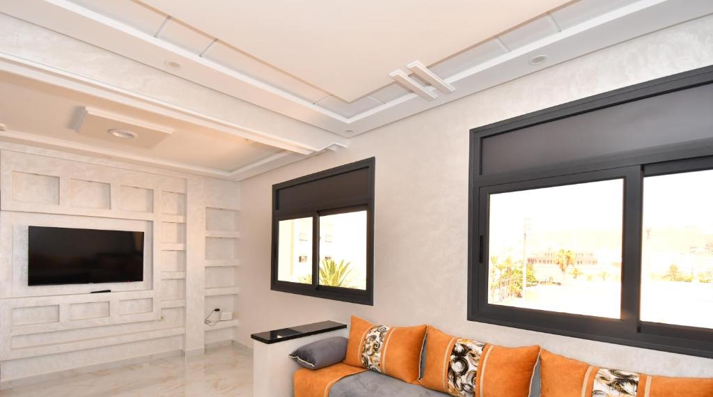TV a/nebo společenská místnost v ubytování Appartement Dalisa