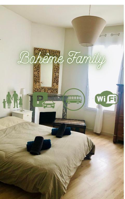 Un ou plusieurs lits dans un hébergement de l'établissement Maison de ville au Cœur d'Angoulême- 2 chambres-Wifi- Cosy - Idéal de 1 à 6 Personnes - conciergerie J&N