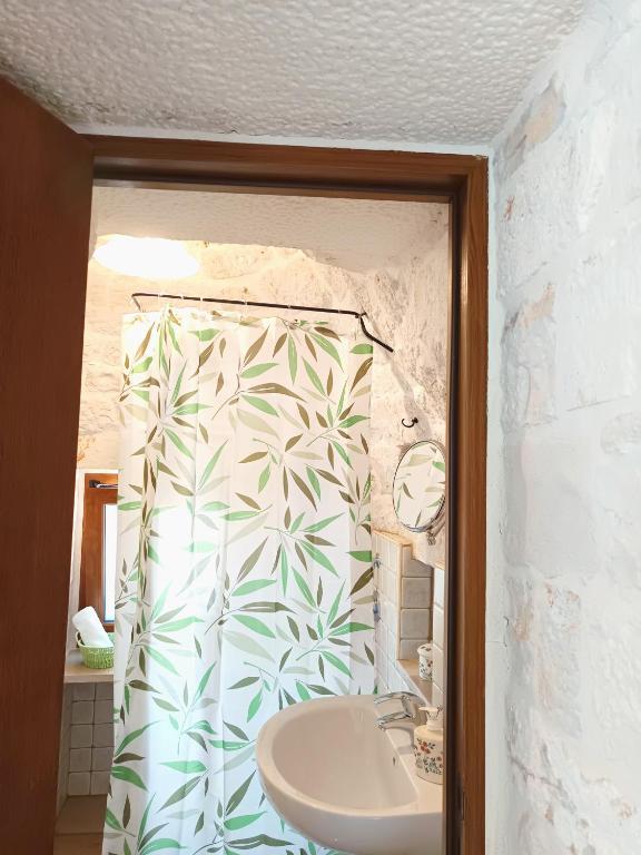 Kúpeľňa v ubytovaní La Rosa dei Trulli B&B