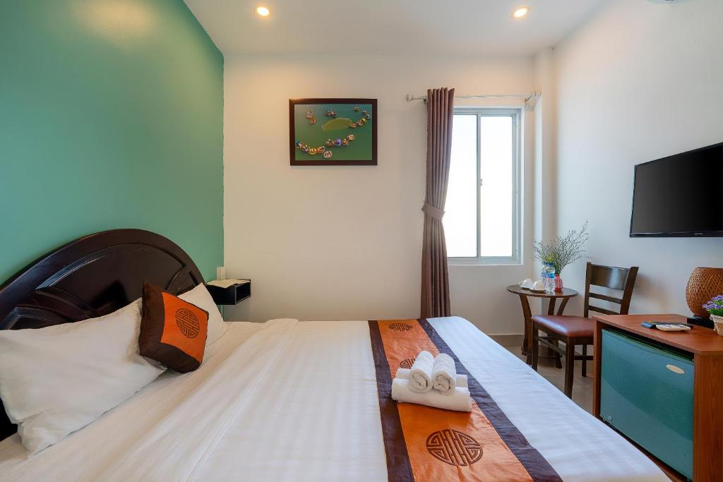 Giường trong phòng chung tại Sam Sam Homestay
