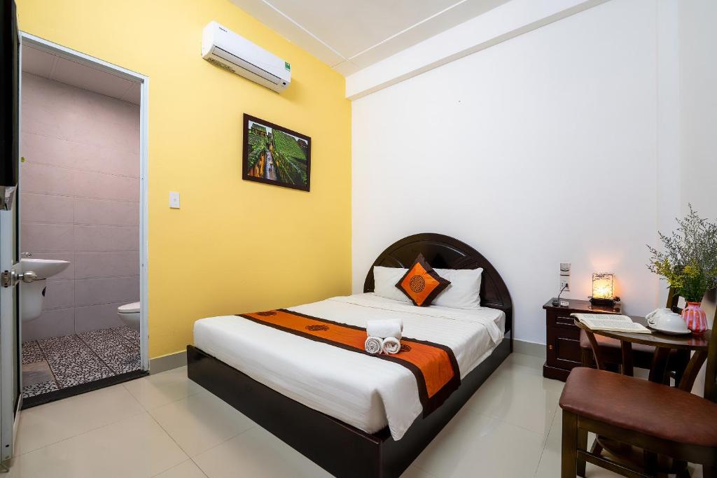Postel nebo postele na pokoji v ubytování Sam Sam Homestay