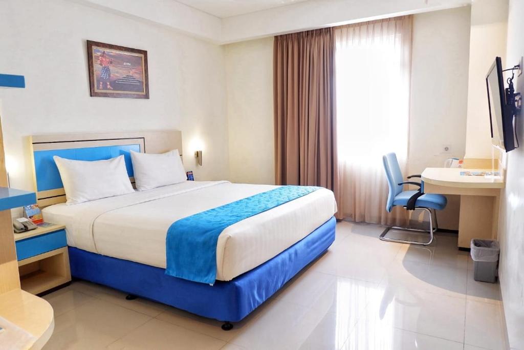 Postel nebo postele na pokoji v ubytování Hotel Brothers Solo