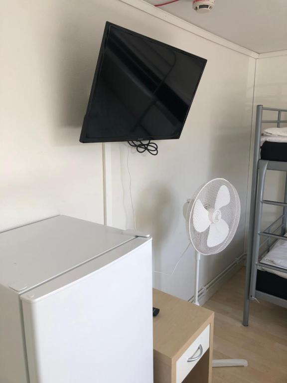 TV a/nebo společenská místnost v ubytování Rum mitt stan