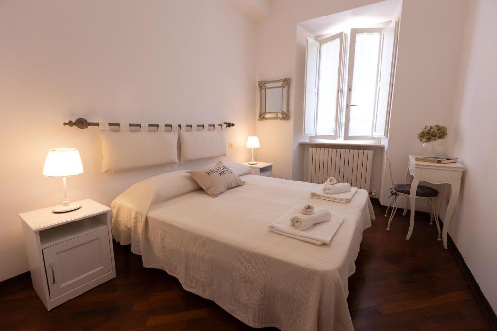 Letto o letti in una camera di Palazzo Antico