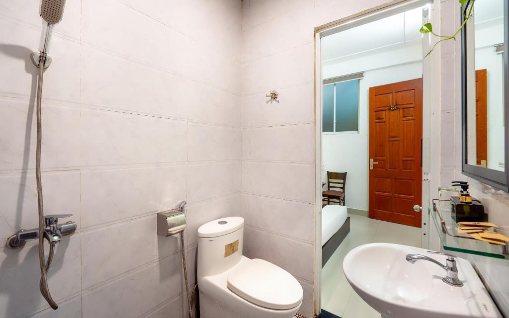 Koupelna v ubytování Sam Sam Homestay