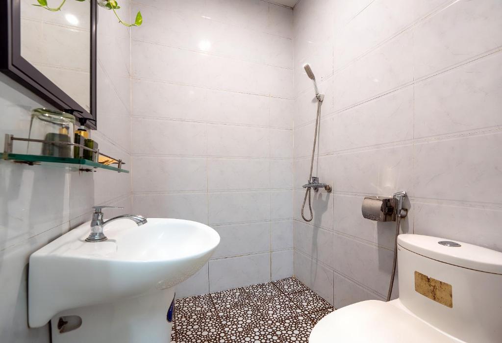 Koupelna v ubytování Sam Sam Homestay