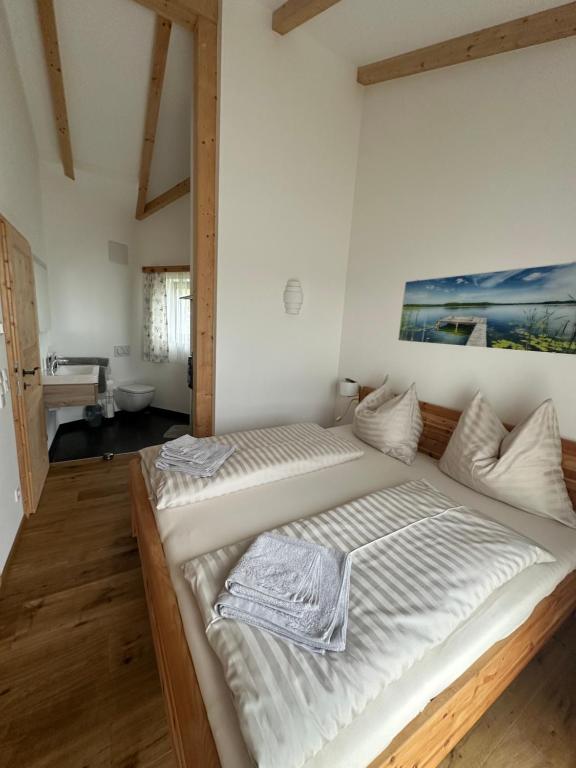 Postel nebo postele na pokoji v ubytování Appartement Weitblick