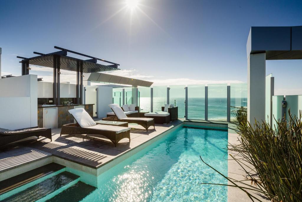 a swimming pool on the roof of a building at Nirvana By The Sea in Gold Coast