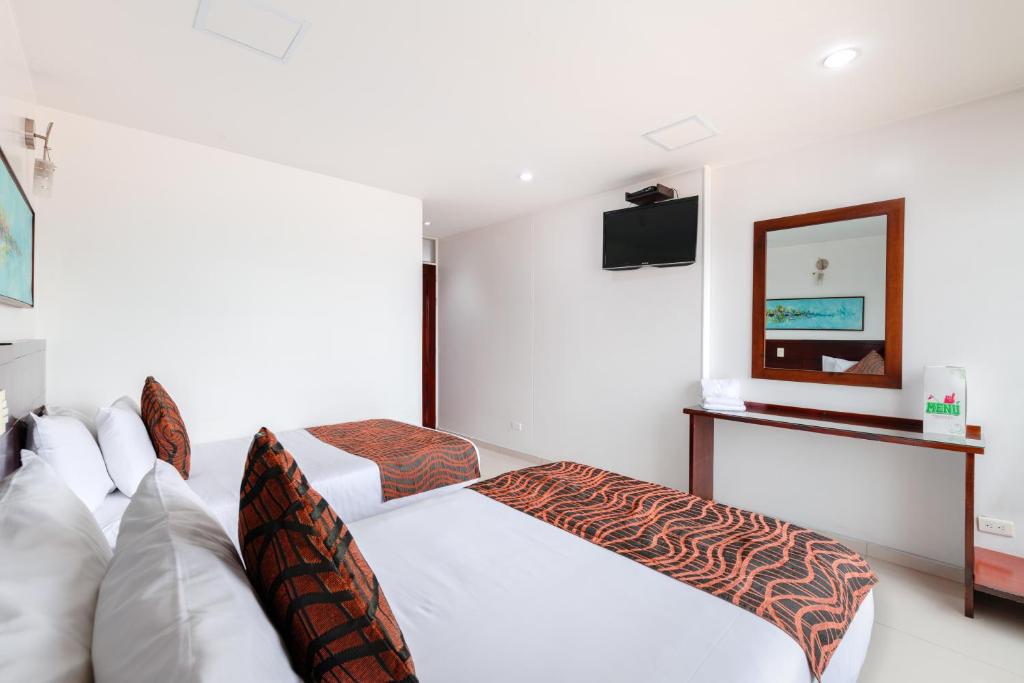 TV a/nebo společenská místnost v ubytování Hotel Parque 63