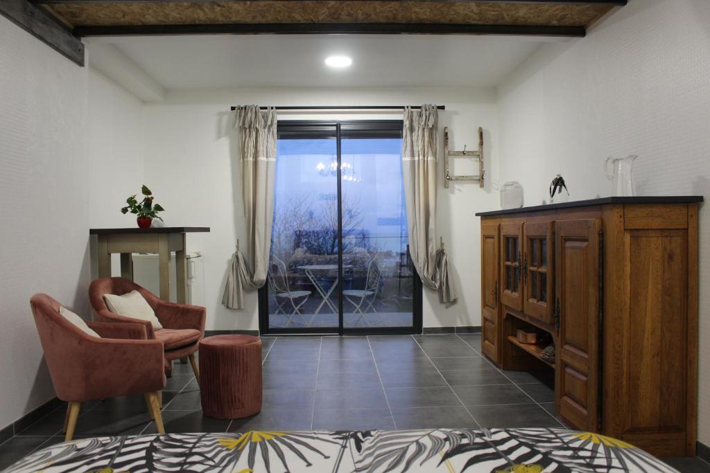 Posezení v ubytování Chambre d'hôtes vue sur mer