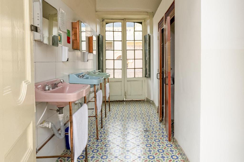 Kuchyň nebo kuchyňský kout v ubytování Hostal R10