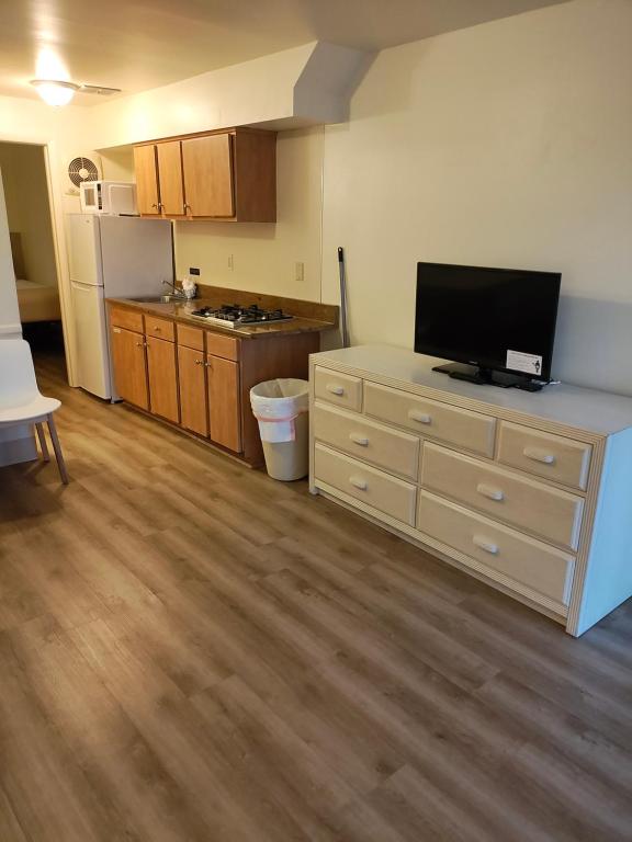 Kuchyň nebo kuchyňský kout v ubytování Condor Motel - Beach Block