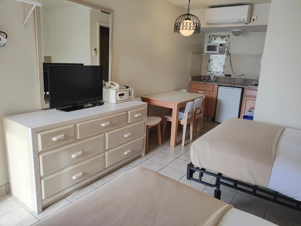 Kuchyň nebo kuchyňský kout v ubytování Condor Motel - Beach Block
