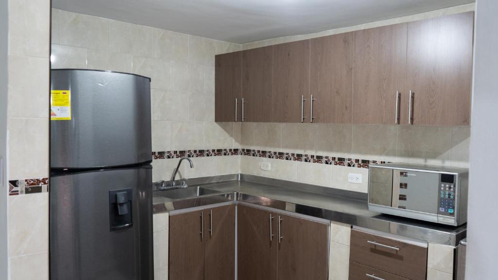 Kuchyň nebo kuchyňský kout v ubytování james house