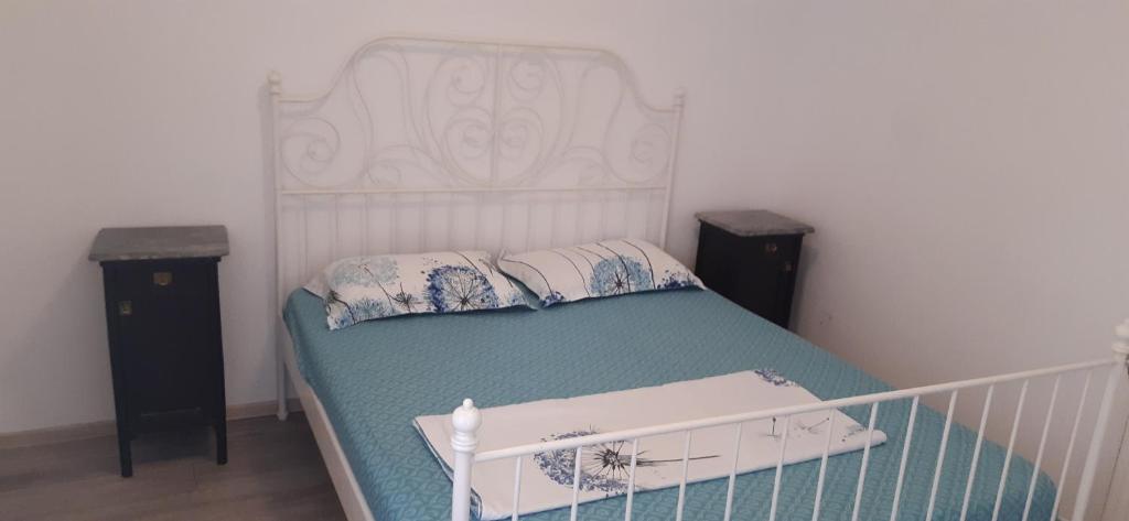 Postel nebo postele na pokoji v ubytování B&B Duo Caffe