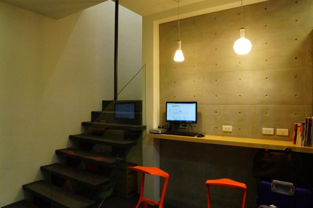 TV a/nebo společenská místnost v ubytování ColorMix Hotel & Hostel
