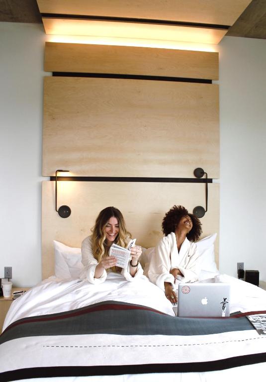 Letto o letti in una camera di The Source Hotel