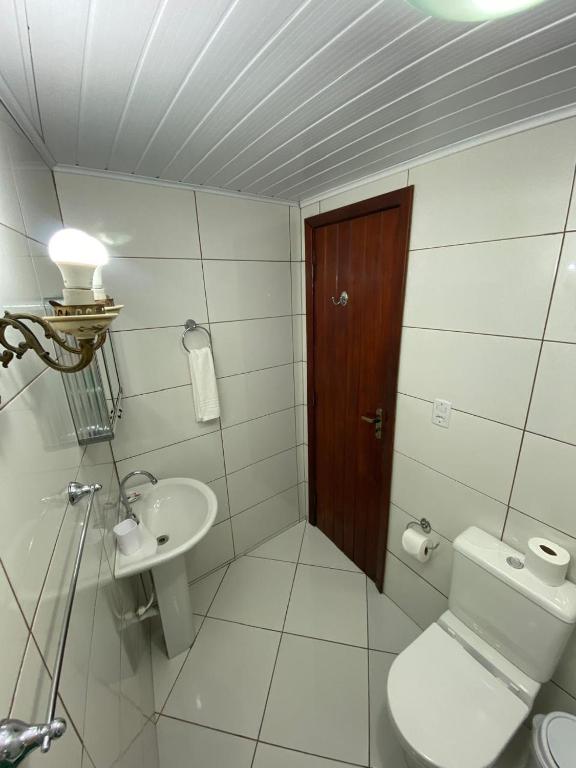 Koupelna v ubytování Aratinga Inn