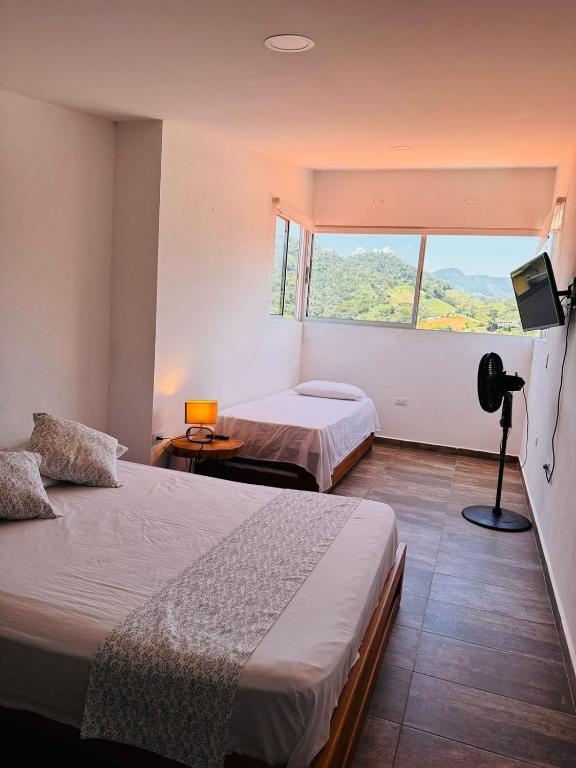 Postel nebo postele na pokoji v ubytování Lagom Apartamentos San Rafael