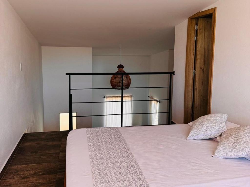 Postel nebo postele na pokoji v ubytování Lagom Apartamentos San Rafael