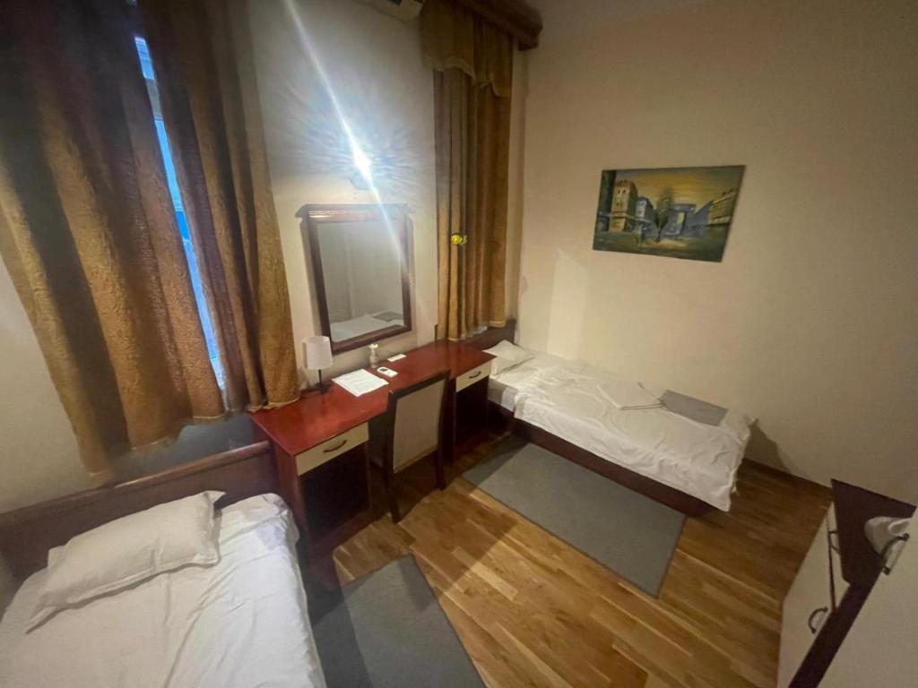 Letto o letti in una camera di Traveling Actor