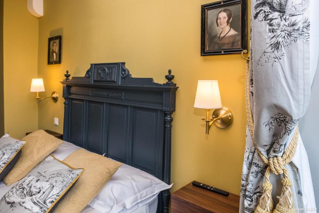 Postel nebo postele na pokoji v ubytování Château de Maillat