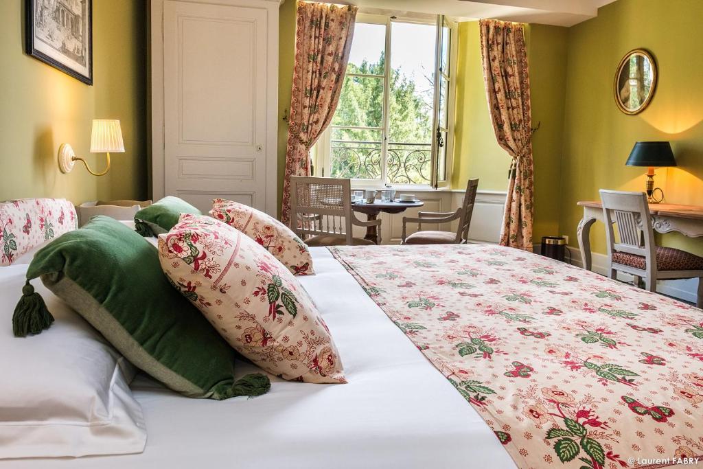 Postel nebo postele na pokoji v ubytování Château de Maillat