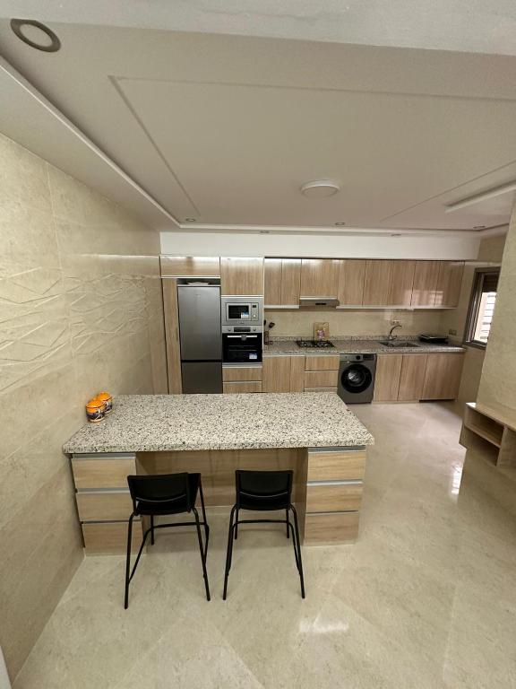 Kuchyň nebo kuchyňský kout v ubytování appartement à fes