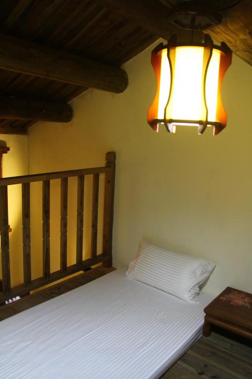 Postel nebo postele na pokoji v ubytování Red Tomato B&B