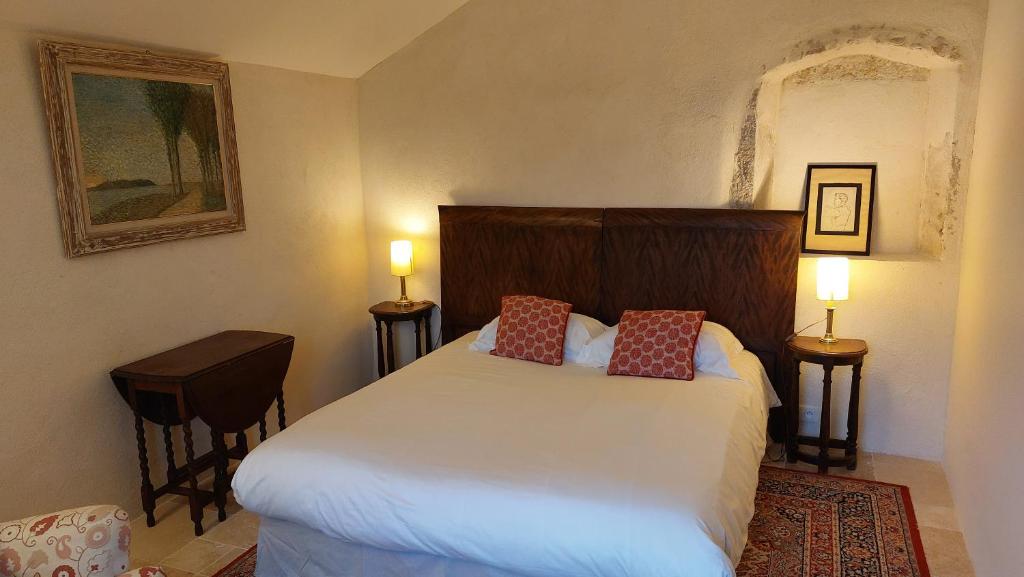 Postel nebo postele na pokoji v ubytování Château de Maillat