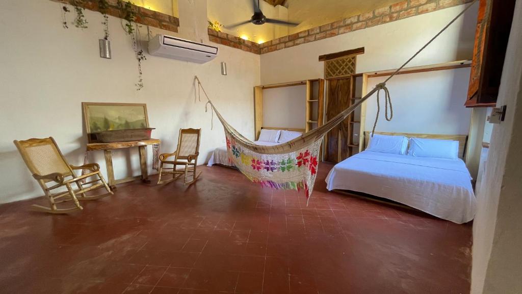 Postel nebo postele na pokoji v ubytování Increible Casa en Mompox con piscina