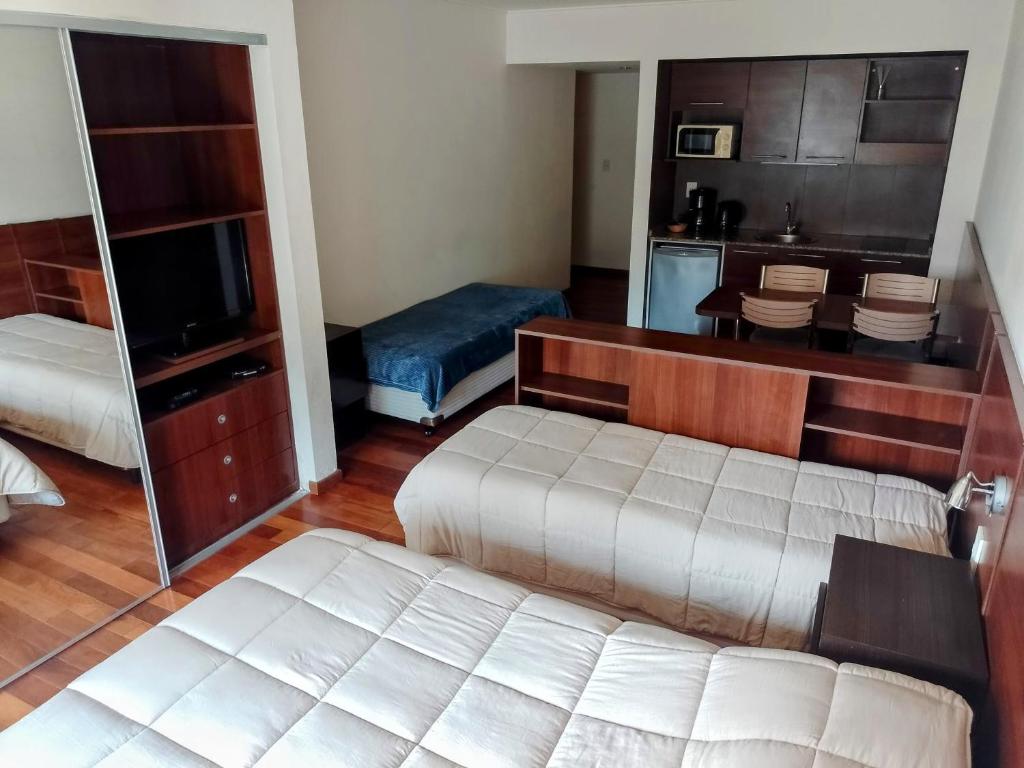 Χώρος καθιστικού στο Madera Suite · Rosario centro y costanera