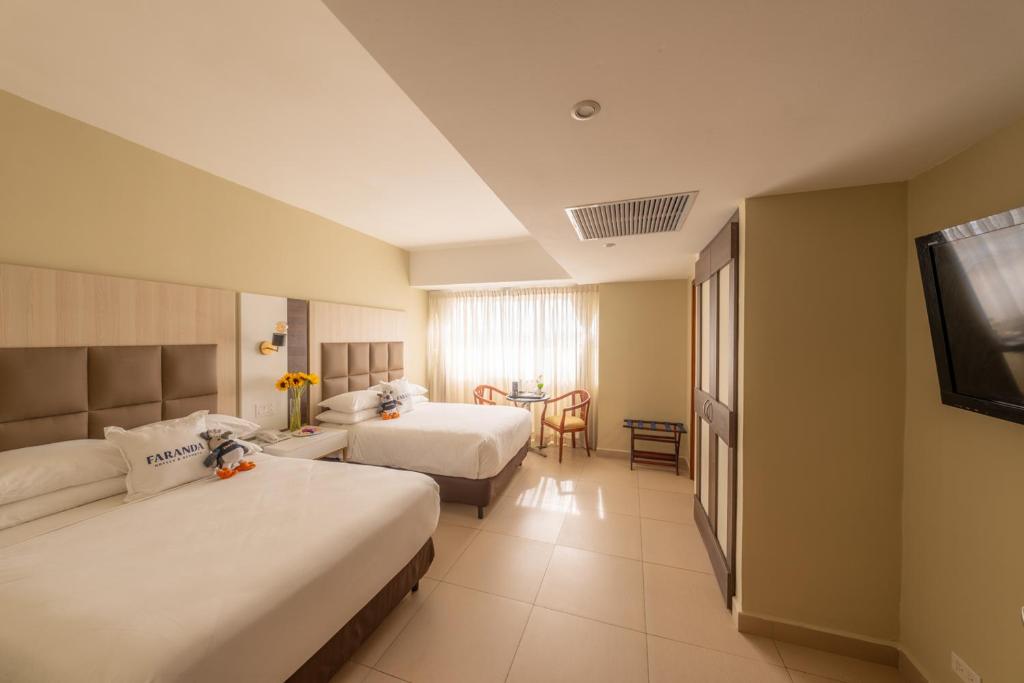 Postel nebo postele na pokoji v ubytování Hotel Faranda Express Soloy and Casino, a member of Radisson Individuals