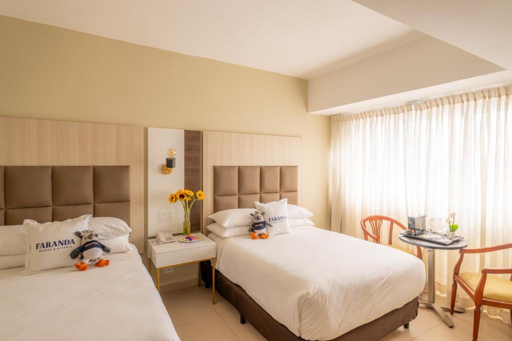 Postel nebo postele na pokoji v ubytování Hotel Faranda Express Soloy and Casino, a member of Radisson Individuals