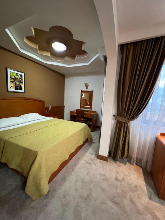 Postel nebo postele na pokoji v ubytování Hotel Princi i Arberit