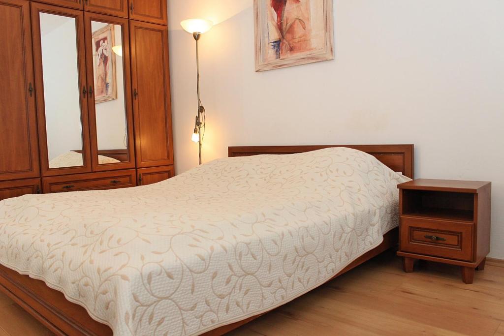 Cama o camas de una habitación en Almafa Apartman