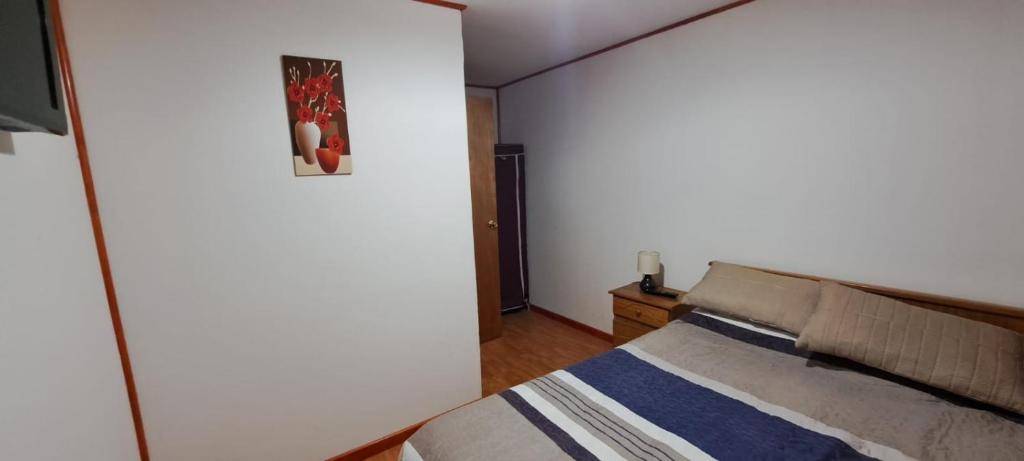 Postel nebo postele na pokoji v ubytování Hotel Cordillera Cabildo