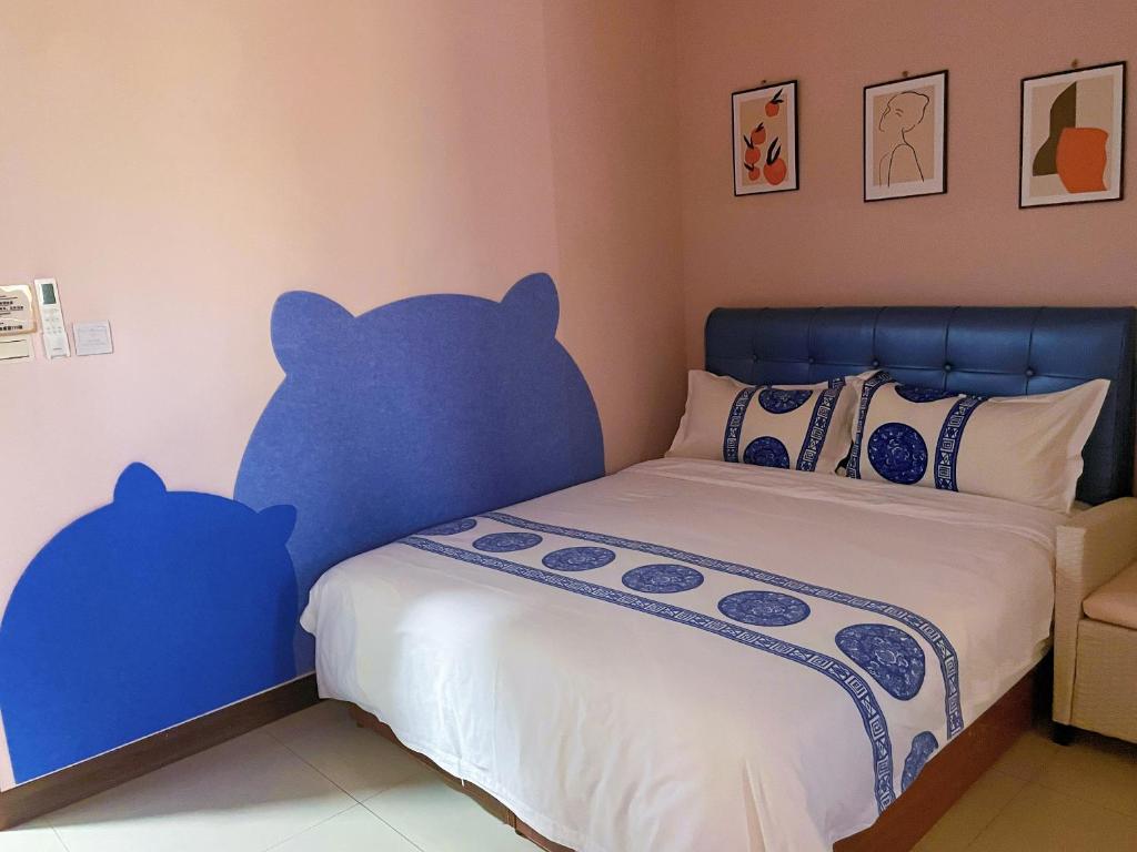 Postel nebo postele na pokoji v ubytování Dear B&B Building II