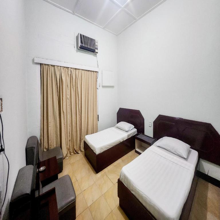 RedDoorz Syariah Near Pelabuhan Sri Bintan Pura Tanjungpinang - Chambre Lits Jumeaux Standard