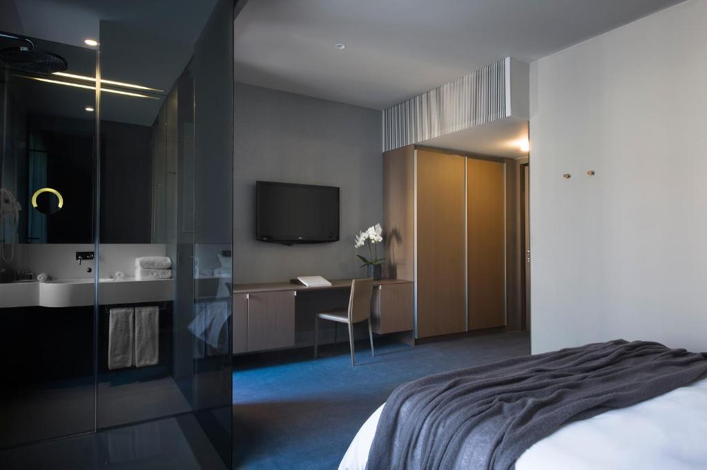Postel nebo postele na pokoji v ubytování Hotel Cubo