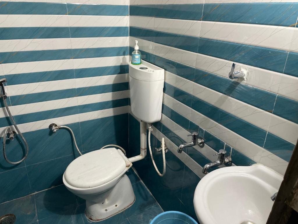 Koupelna v ubytování Shree Balaji Homestay