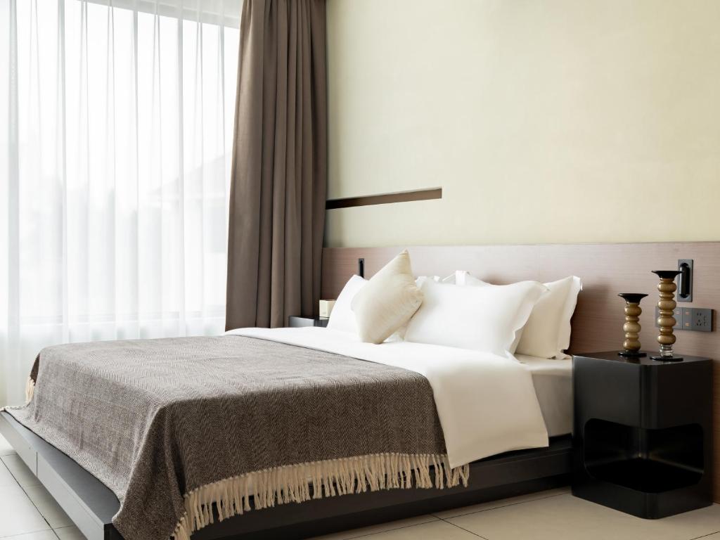 Postel nebo postele na pokoji v ubytování 257 Summer Hotel