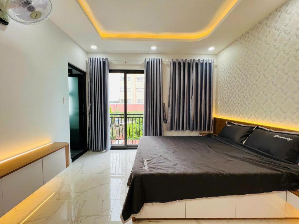 Postel nebo postele na pokoji v ubytování Thạch Đà Motel