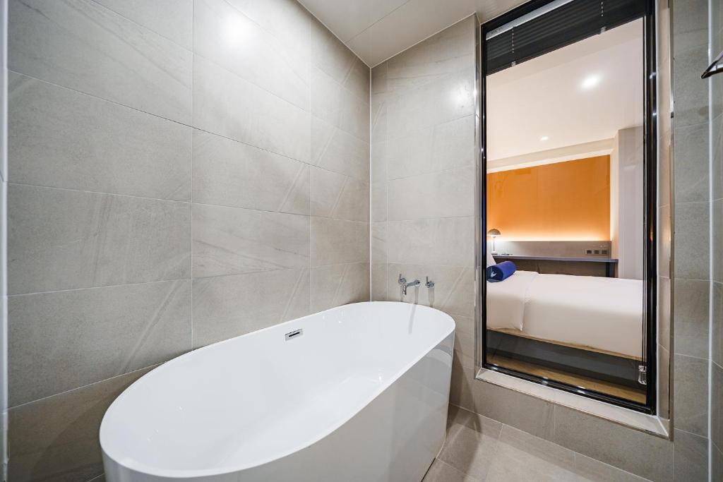 Koupelna v ubytování Hound Hotel Hadan