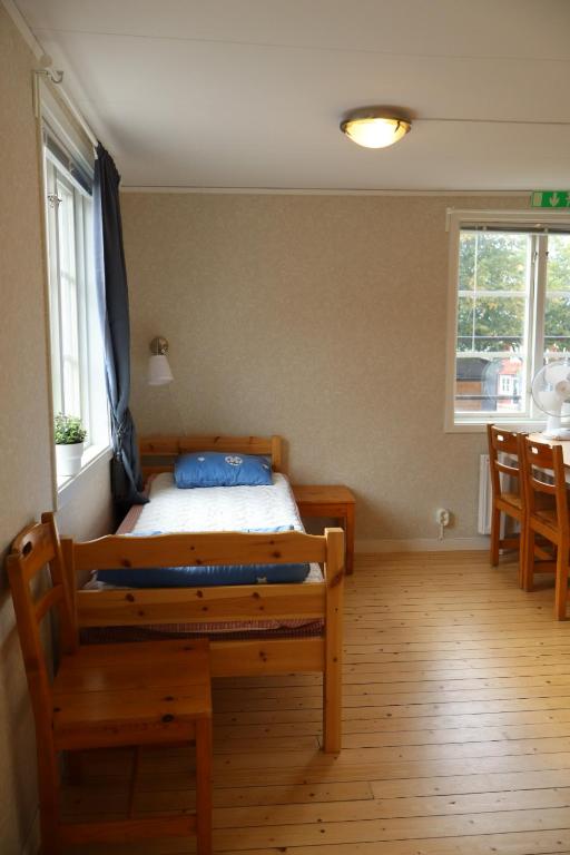 Postel nebo postele na pokoji v ubytování STF Hostel Mariestad