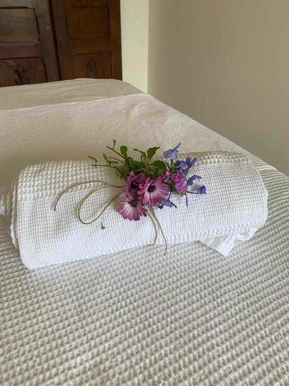 Postel nebo postele na pokoji v ubytování Corte Mercurio B&B
