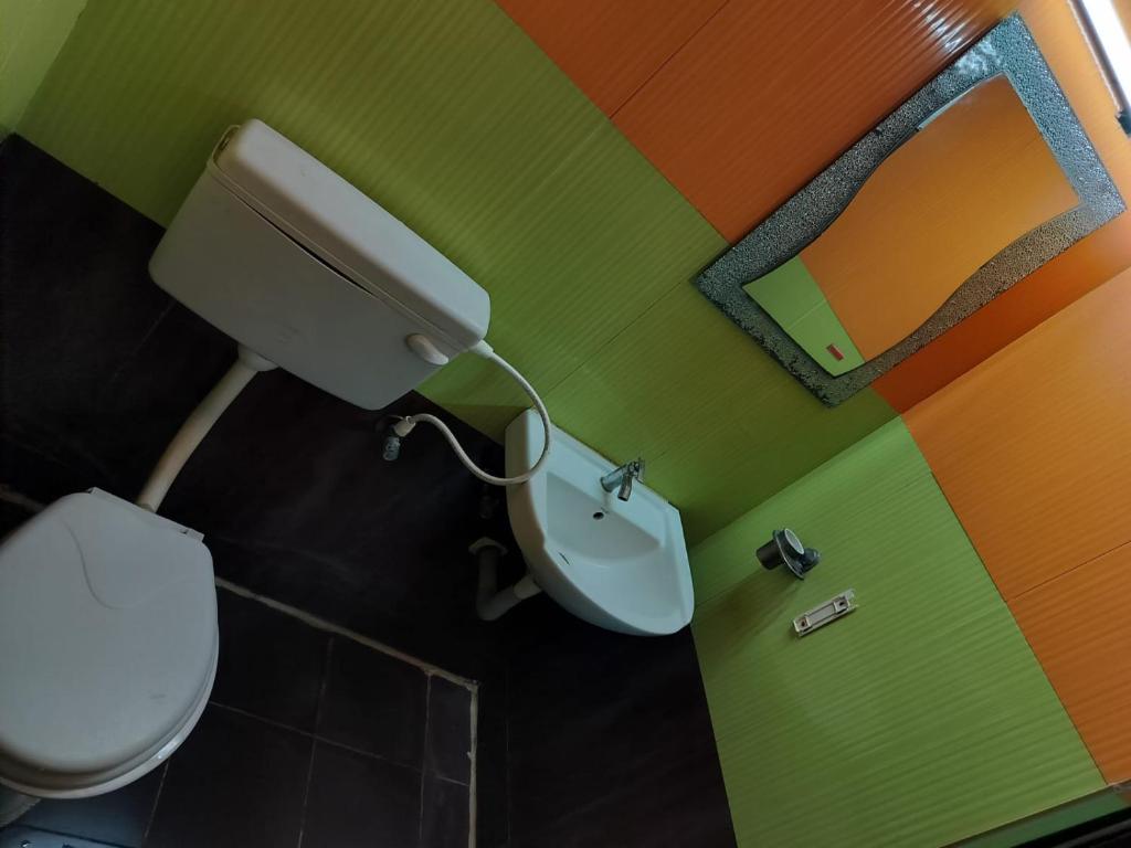 Koupelna v ubytování AKSHAY RESIDENCY
