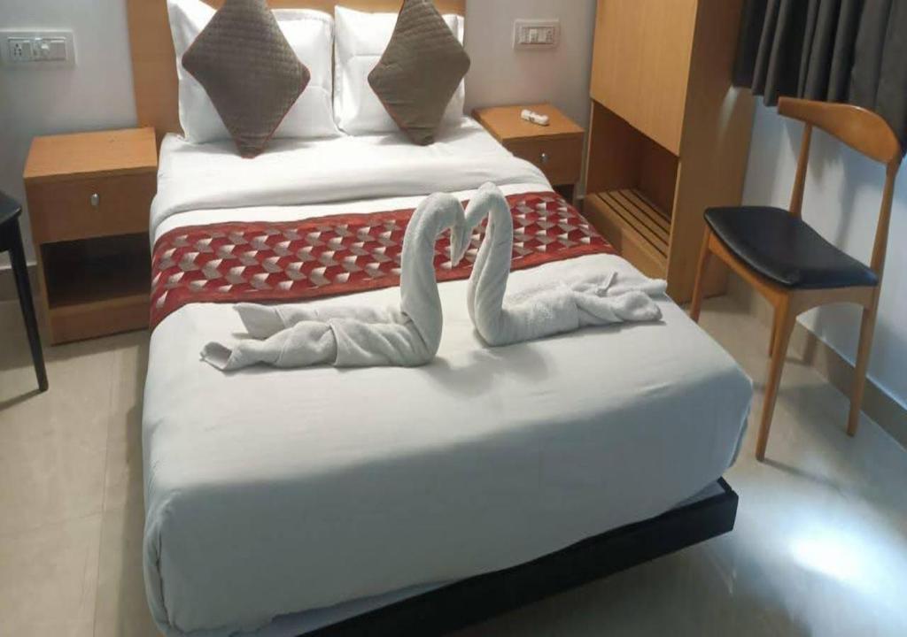 Postel nebo postele na pokoji v ubytování Akshay home stay